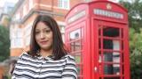 Kiran outside the phone box in Forest Gate, where she was found. Credit: SWNS